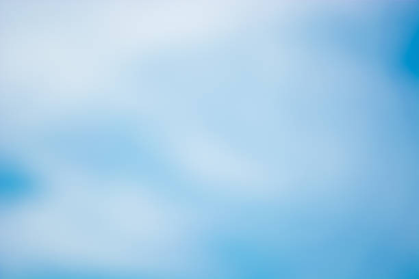 istock Abstract blurred background Blue sky with white clouds in sunlight. 1139729726