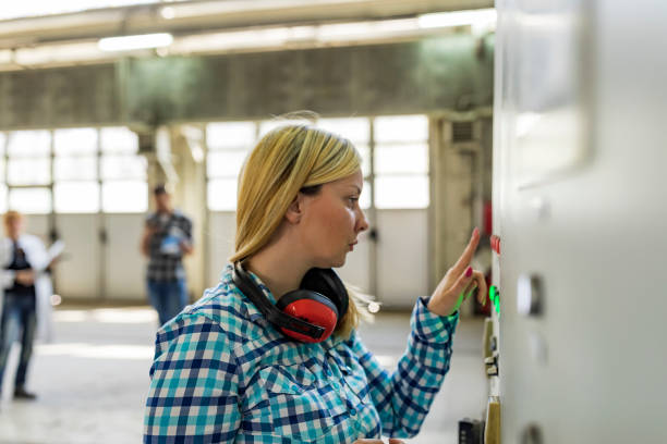 istock Young Female Technician is Checking Heating System in Boiler Room 1139732011