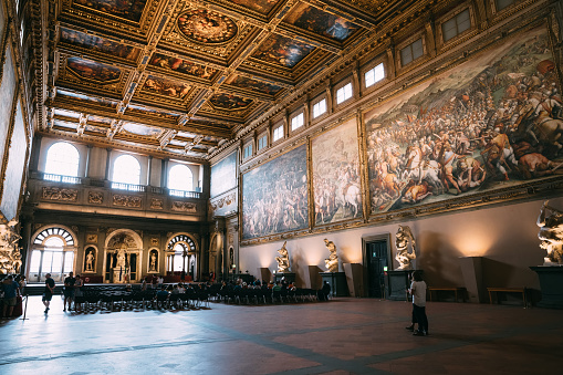 Florence, Italy - June 24, 2018: Panoramic view of interior and arts of Palazzo Vecchio (Old Palace) is the town hall of Florence