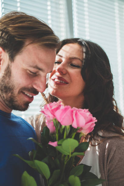 istock Happy woman received roses from her husband 1139737155