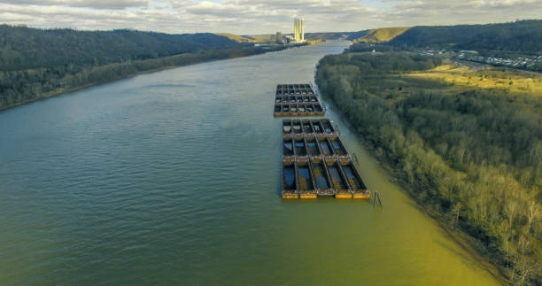istock Barge Containers in Ohio River with Power Plant Aerial View 1139737206