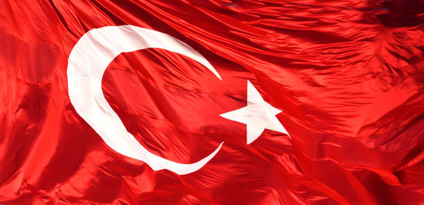 waving turkish flag in windy weather waving turkish flag in windy weather natural landmark photos stock pictures, royalty-free photos & images
