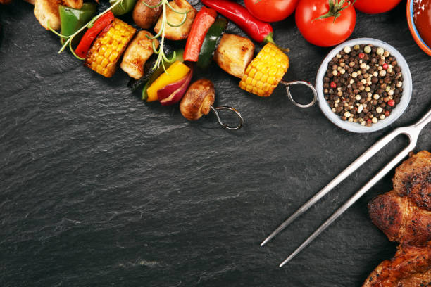 istock Assorted delicious grilled meat and skewer with vegetable on rustic table 1139740572