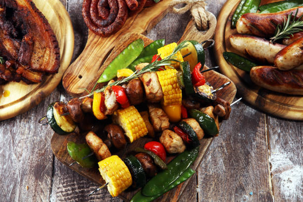 istock Assorted delicious grilled meat and skewer with vegetable on rustic table 1139741660