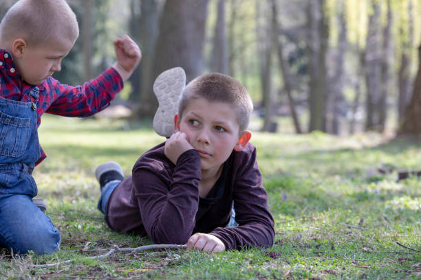istock Two young brothers quarreling 1139741695