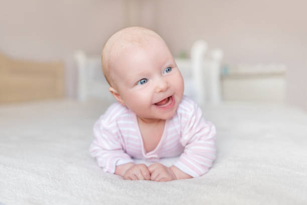 istock A small baby in a good mood. 1139743212