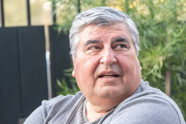 istock Overweight mature/senior man looking away 1139749269