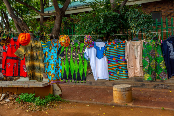 African Curios and  Traditional clothing This pic show Traditional  African Curios and clothing hanging. The pic is taken in johannesburg in day time and in month of march 2019. Pic shows colorful African Curios. soweto stock pictures, royalty-free photos & images