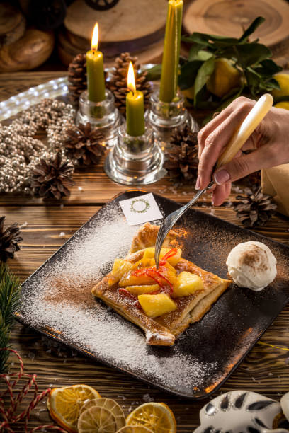 istock Pineapple Danish Pastry on wooden table on christmas decorated background 1139753506