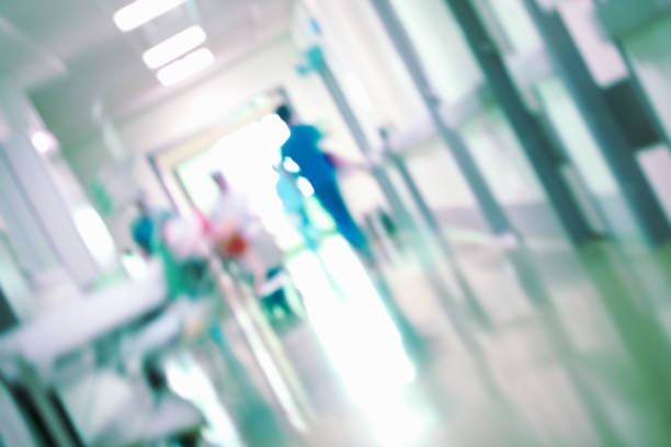 istock Worker people in the hospital hallway, unfocused background 1139755565