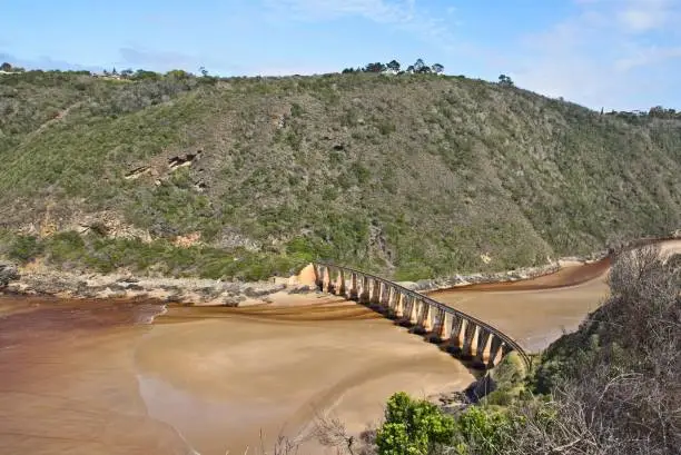 Photo of Kaaimans River Railway Bridge, Wilderness, South Africa. This is a popular tourist attraction on the Garden Route.