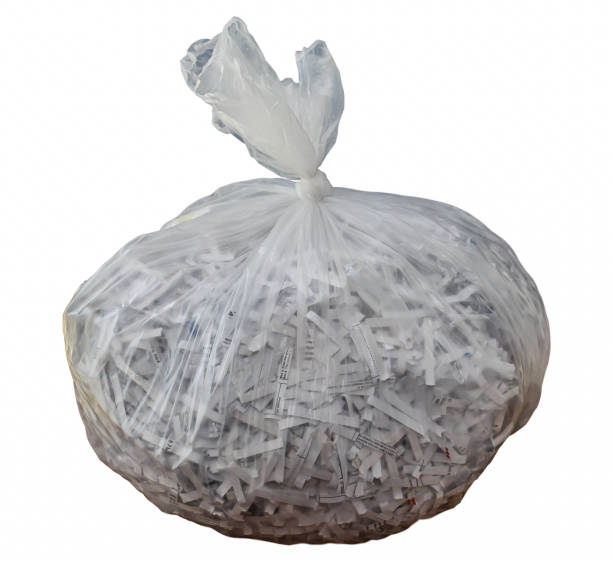 istock Plastic bag with shredded paper inside plastic bag isolated on white background 1139759791