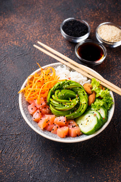 istock Hawaiian poke bowl with salmon, rice and vegetable 1139760425