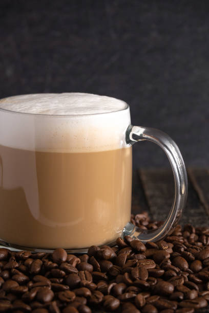 istock A Cafe Latte Coffee in a Clear Glass Mug in a Dark Environment 1139770705