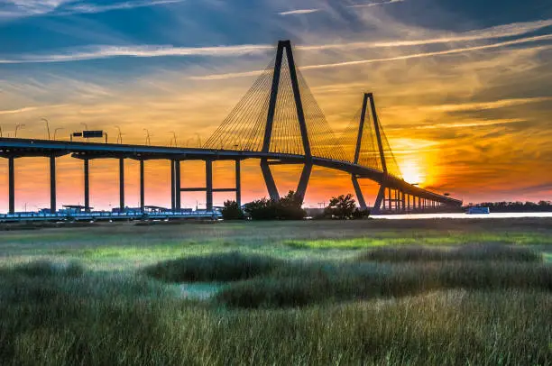 The Ravenel Bridge crosses the Cooper River and connects Charleston with Mount Pleasant South Carolina. It is 13,200 feet long (2.5 miles) and is the third longest cable stayed bridge in the Western Hemisphere.