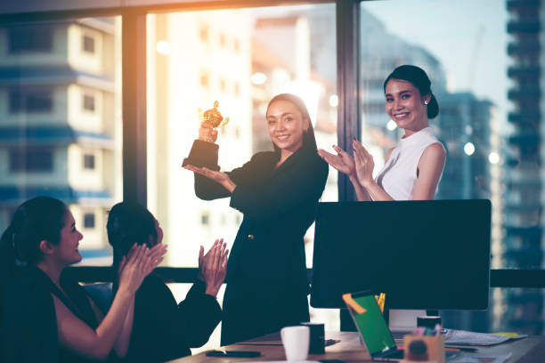 istock Successful team. Group of young business people working and communicating together in creative office 1139772075
