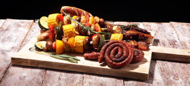 istock Assorted delicious grilled meat and skewer with vegetable on rustic table 1139773932