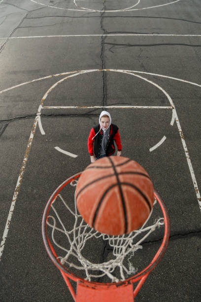 istock Teen boy playing Basket ball hoop 1139774807