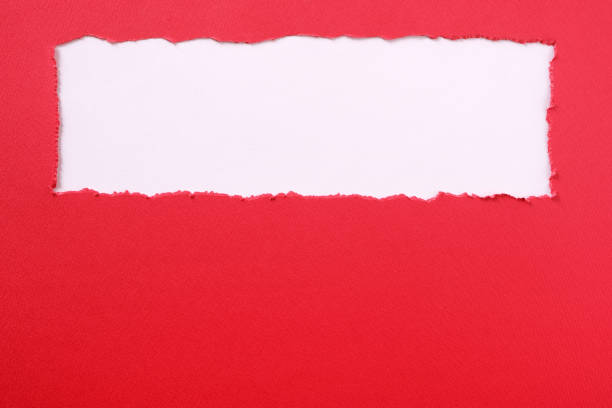 istock Torn red paper strip banner ripped edge headline white background 1139777631