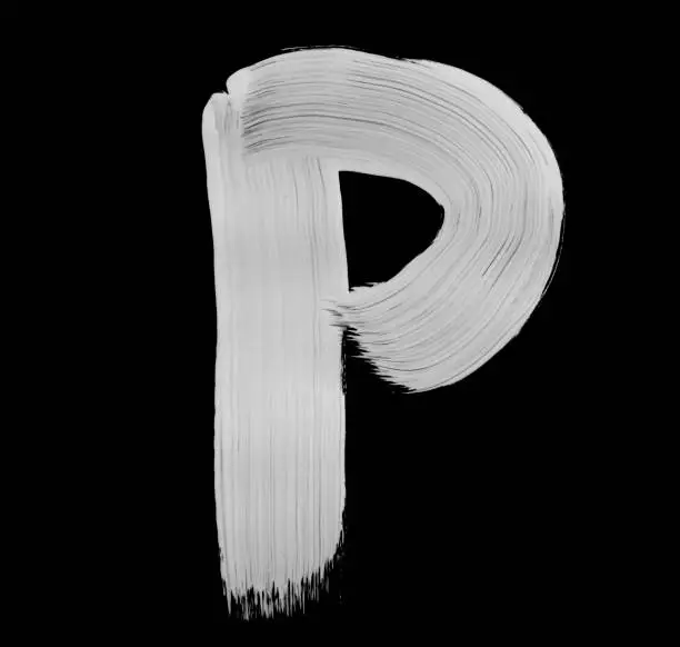 Paint brush stroke of letter, isolated on a black background. High detailed macro studio photographed handwriting.