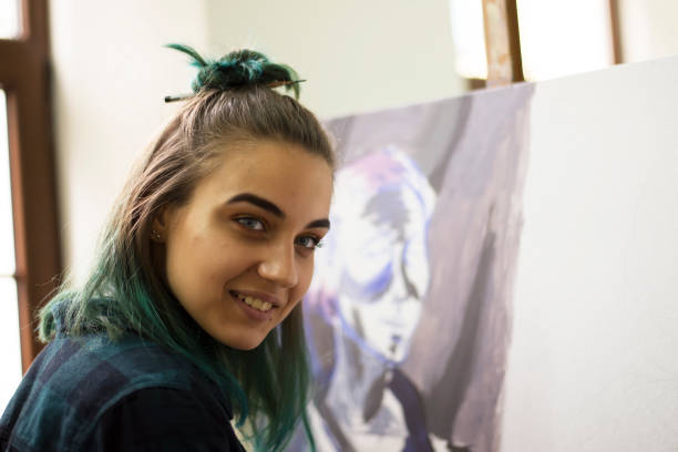 istock Young artists, students are painting in the studio. 1139779171