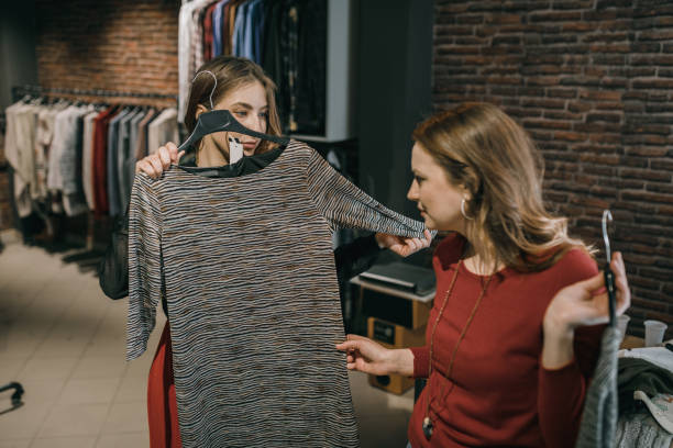 istock Woman having an assistance while shopping for clothes 1139779498