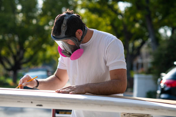 Young Entrepreneur Crafting A Custom Surfboard
