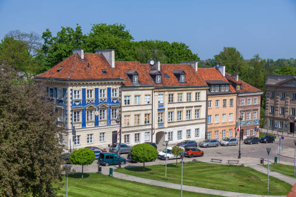 istock Early color houses surrounded by green trees. Warsaw 1139781237