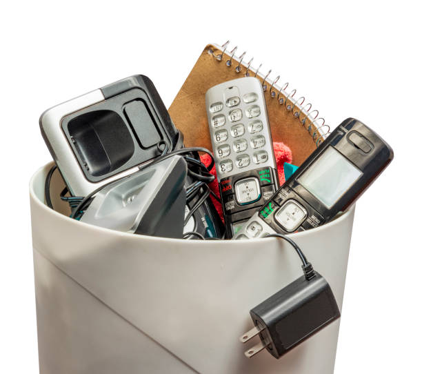 istock Landline Phones In The Trash 1139781347