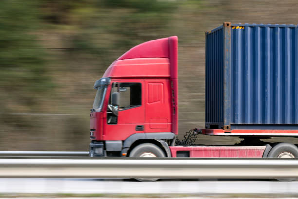 istock Red Truck On The Highway 1139784096