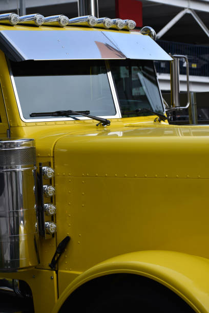 Yellow Big Rig Truck with Air Cleaner and Front Windows Close-up Downtown Los Angeles steven harrie stock pictures, royalty-free photos & images