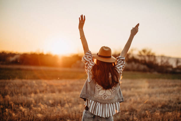 istock Peaceful woman having fun in meadow 1139787318