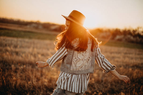 istock Peaceful woman having fun in meadow 1139787349