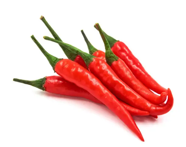 Fresh juicy peppers isolated on a white background.