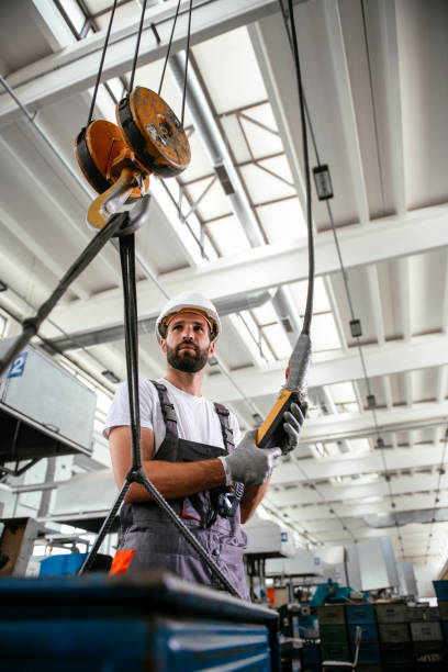 istock Factory worker at production line 1139789250