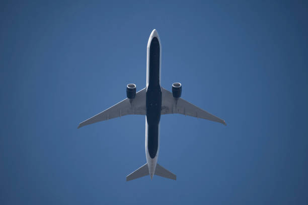 istock Large commercial airplane in the sky 1139789273