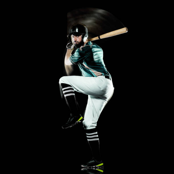 istock baseball player man isolated black background light painting 1139789433