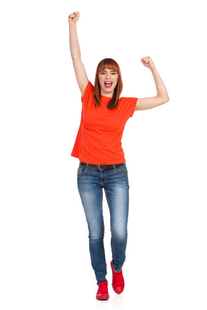 istock Happy Young Woman Is Walking And Cheering 1139790559