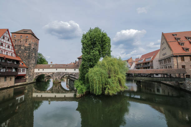 istock Historical old town of Nuremberg on a calm river 1139792795