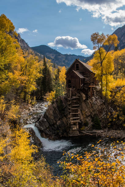 istock Old power generator mill Aspen area 4x4 road through aspen trees 1139795434