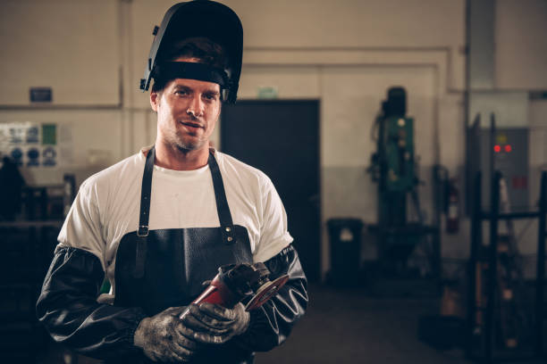 istock Industrial Welder With Torch 1139795503