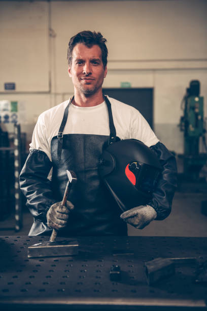 istock Industrial Welder With Torch 1139796124