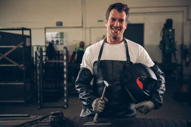 istock Industrial Welder With Torch 1139796144