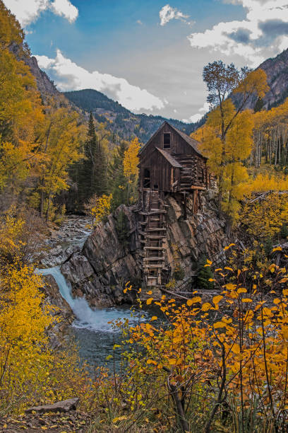 istock Old power generator mill Aspen area 4x4 road through aspen trees 1139796894