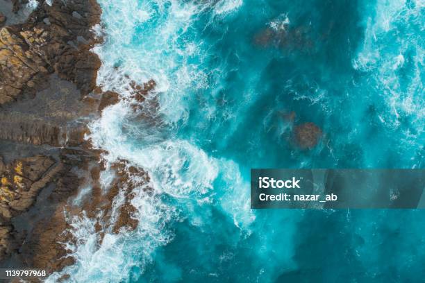 Aerial View Of Waves Splashing On Beach Stock Photo - Download Image Now - Sea, Aerial View, Landscape - Scenery