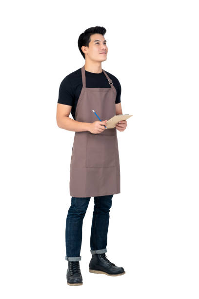 istock Handsome Asian man wearing apron as a barista 1139798866
