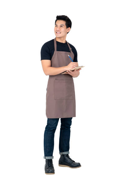 istock Handsome Asian man wearing apron as a barista 1139798886