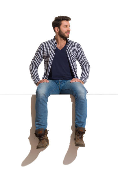 istock Handsome Man Is Sitting Relaxed On A Top And Looking Away 1139798953