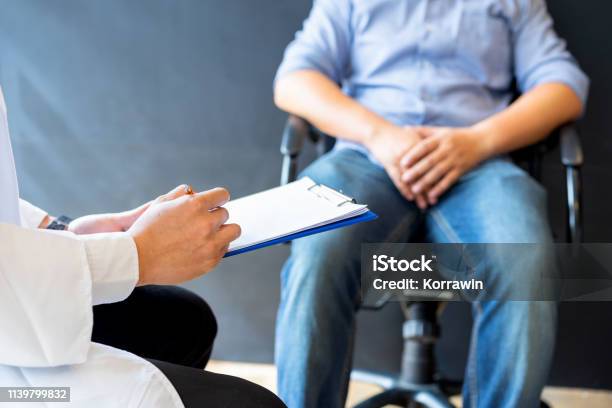 Male Doctor And Prostate Cancer Patient Are Discussing About Prostate Cancer Test Report Diagnostic Prevention Of Men Diseases Healthcare Medical Service Consultation Healthy Lifestyle Concept Stock Photo - Download Image Now