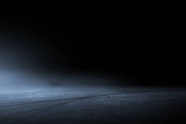 istock Asphalt surface, racetrack of fog on a black background 1139803052